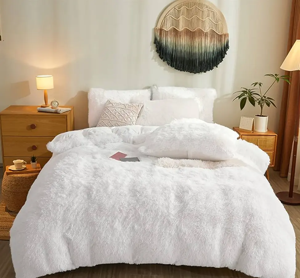 bed with crisp white sheets, a fluffy duvet, and colorful accent pillows